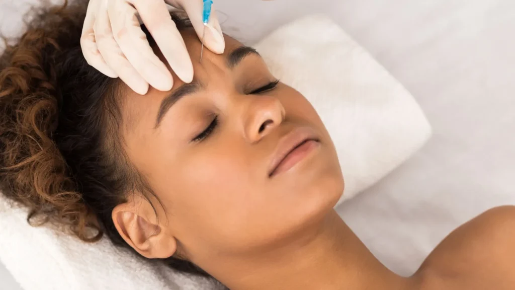 Client receiving a BOTOX® Cosmetic injectable treatment for smooth, natural-looking facial rejuvenation in Timonium, Maryland.