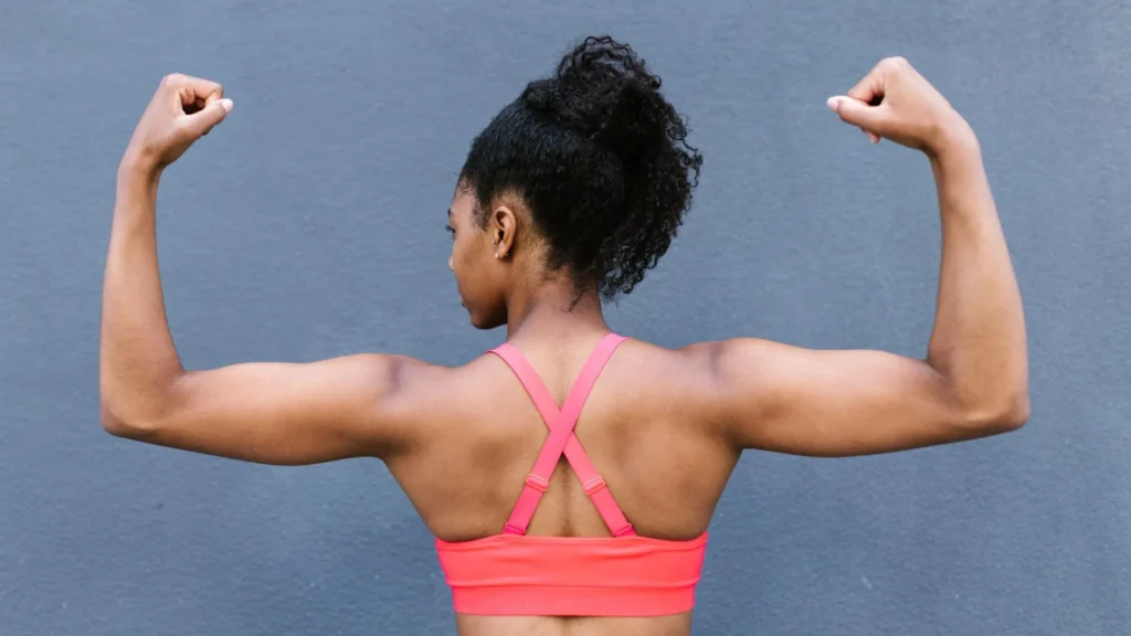 Woman showing toned arms and back representing Hunt Valley body sculpting with Body Scientific Aesthetics.