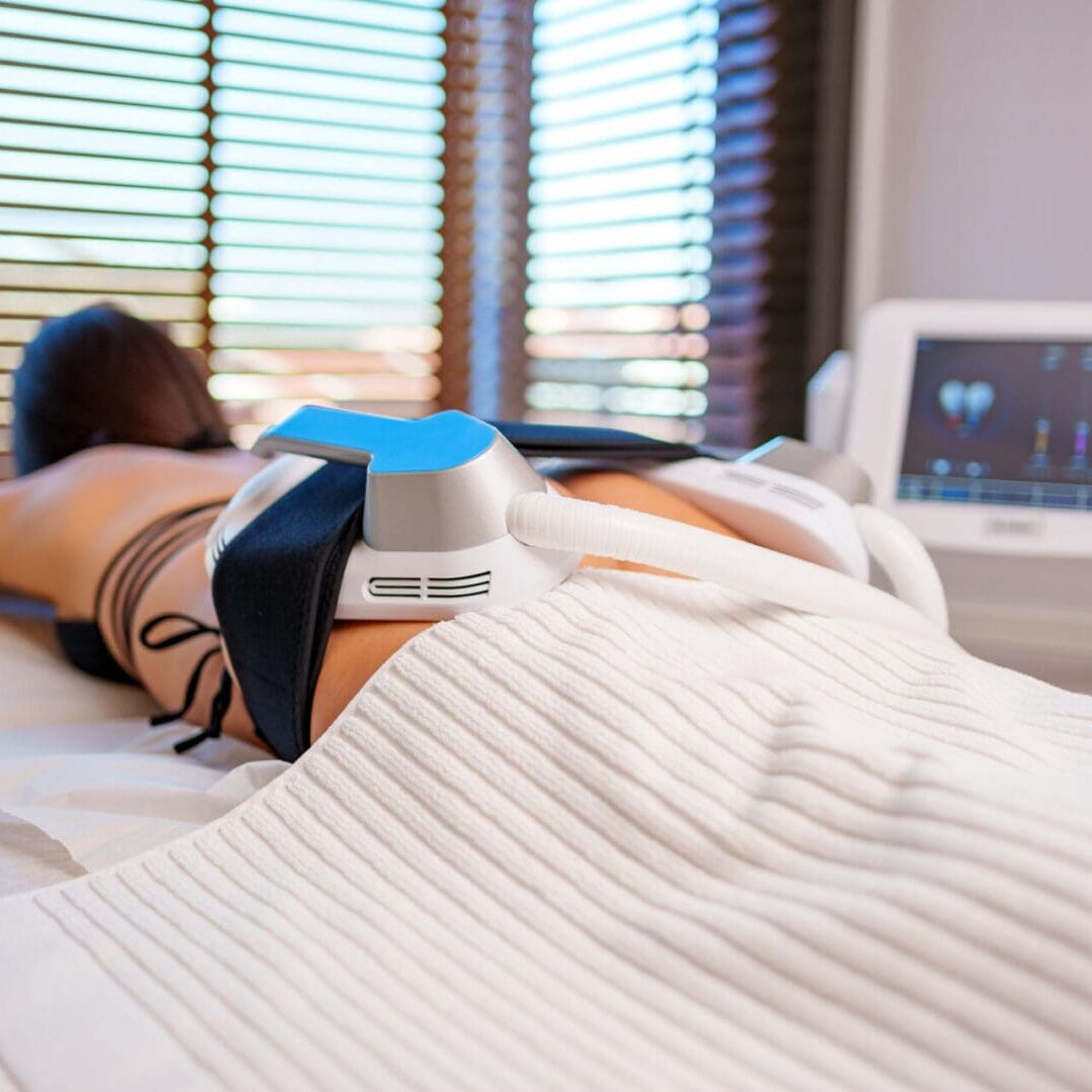 Patient undergoing a blood pressure check in a clinical setting.