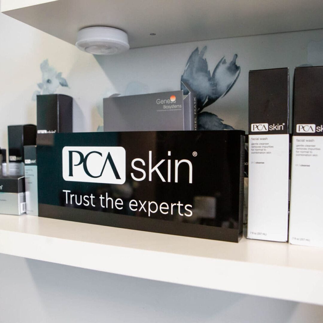 PCA Skin products displayed with a sign saying 'Trust the experts'.