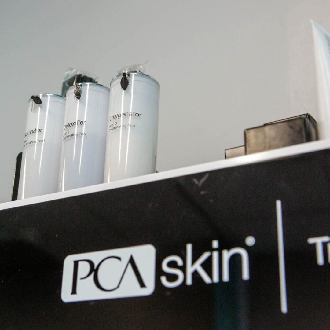 Display of PCA Skin products on a shelf.