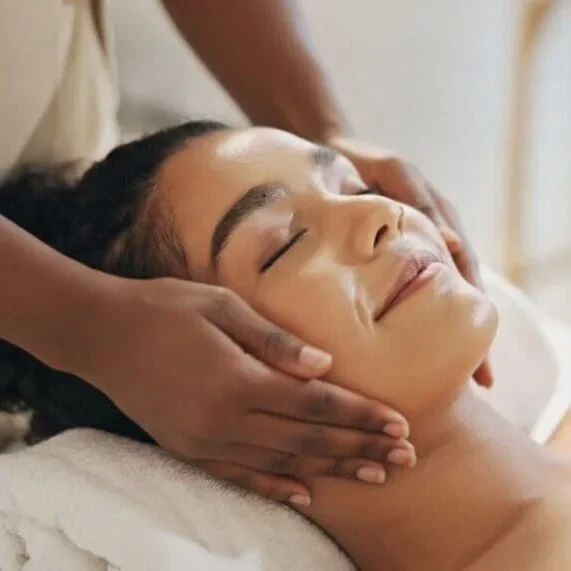 Close-up of a woman receiving a medical-grade facial treatment with a soothing mask at Body Scientific Aesthetics in Timonium, Maryland.