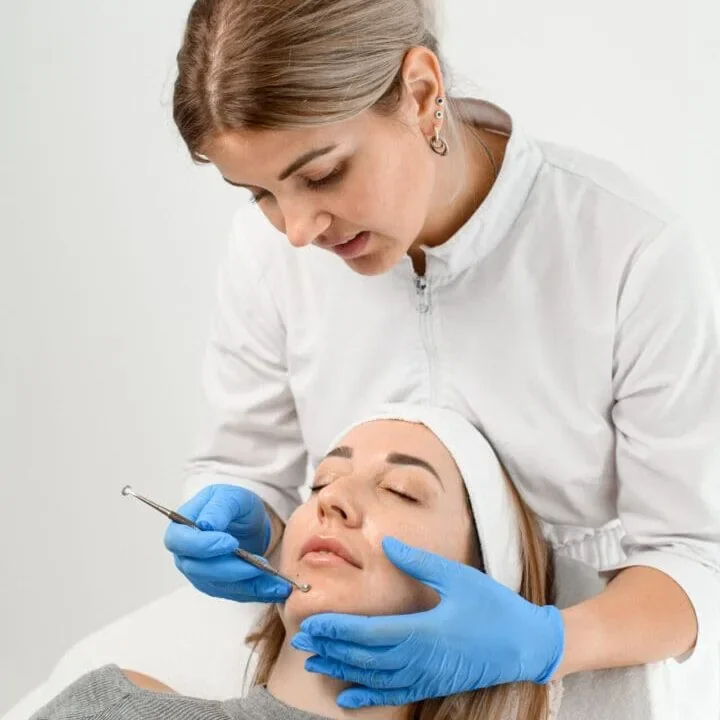 Client receiving a skin revision and acne-focused facial treatment near Perry Hall and Rosedale, Maryland.